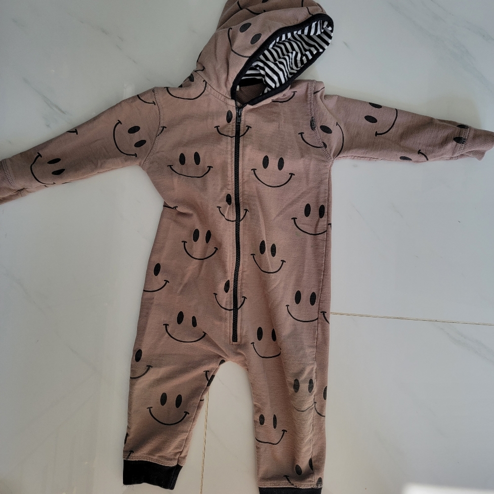 Turtledove London Smiley face onesie